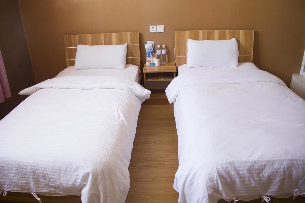 Циндао: Qingdao Qianshanhouhai Apartment