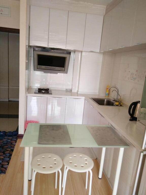 Далянь: Dalian Xiu Zhu Mansion Apartment