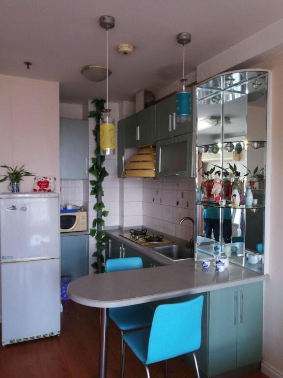 Далянь: Dalian Xiu Zhu Mansion Apartment