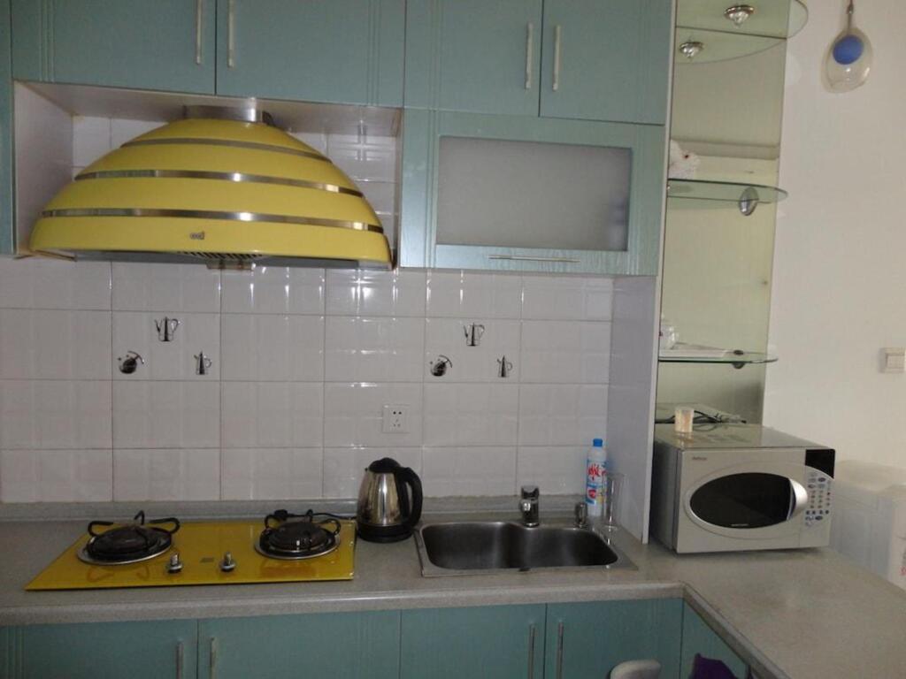 Далянь: Dalian Xiu Zhu Mansion Apartment