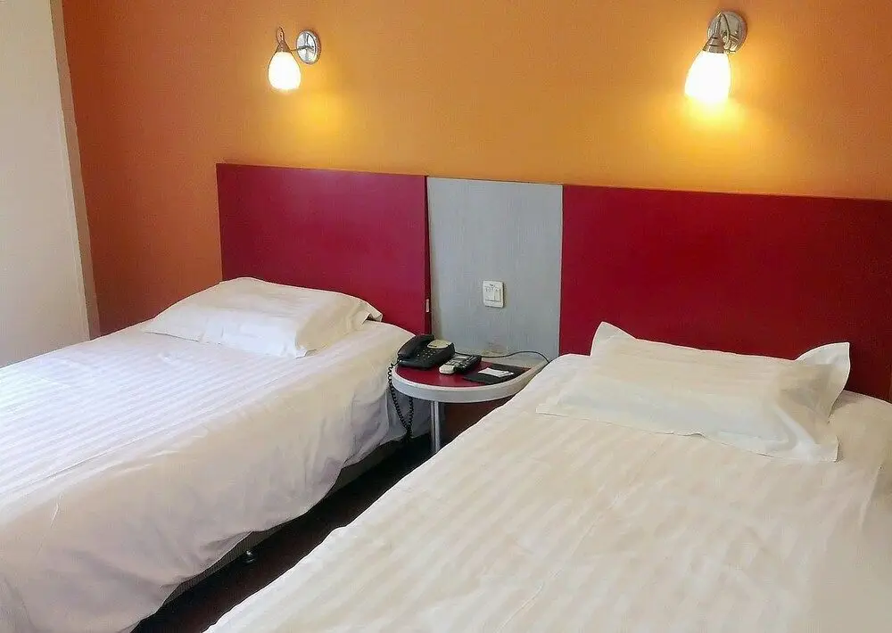 Уси: Motel 168 Hotel