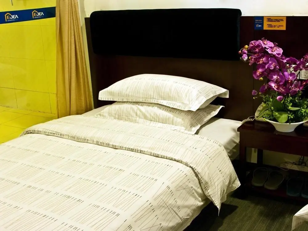 Уси: Ejea Hotel