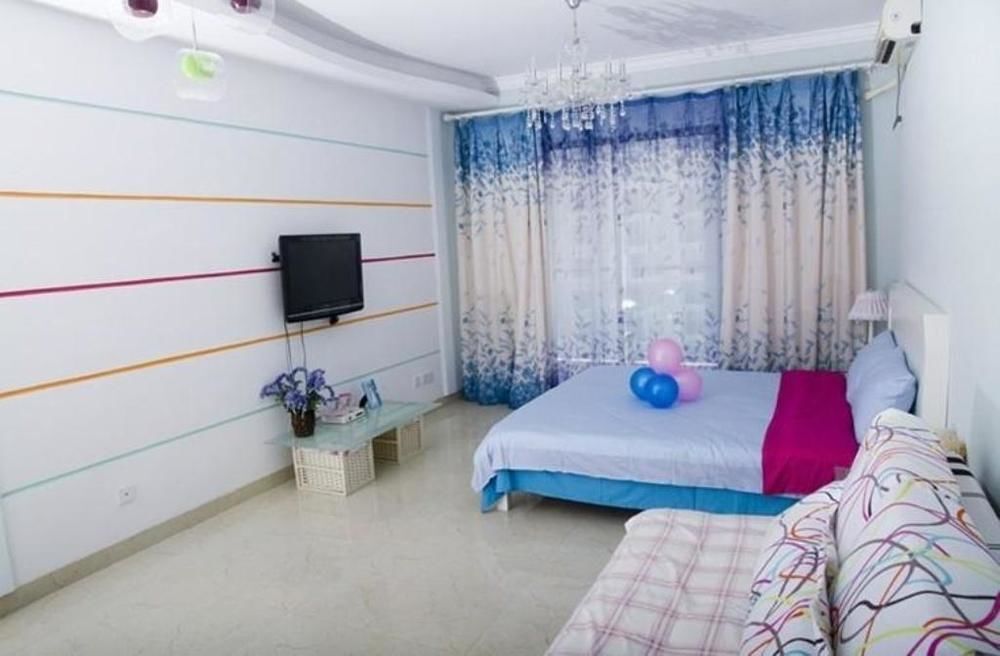 Санья: 三亚海梦情缘度假公寓(兰海五期店)