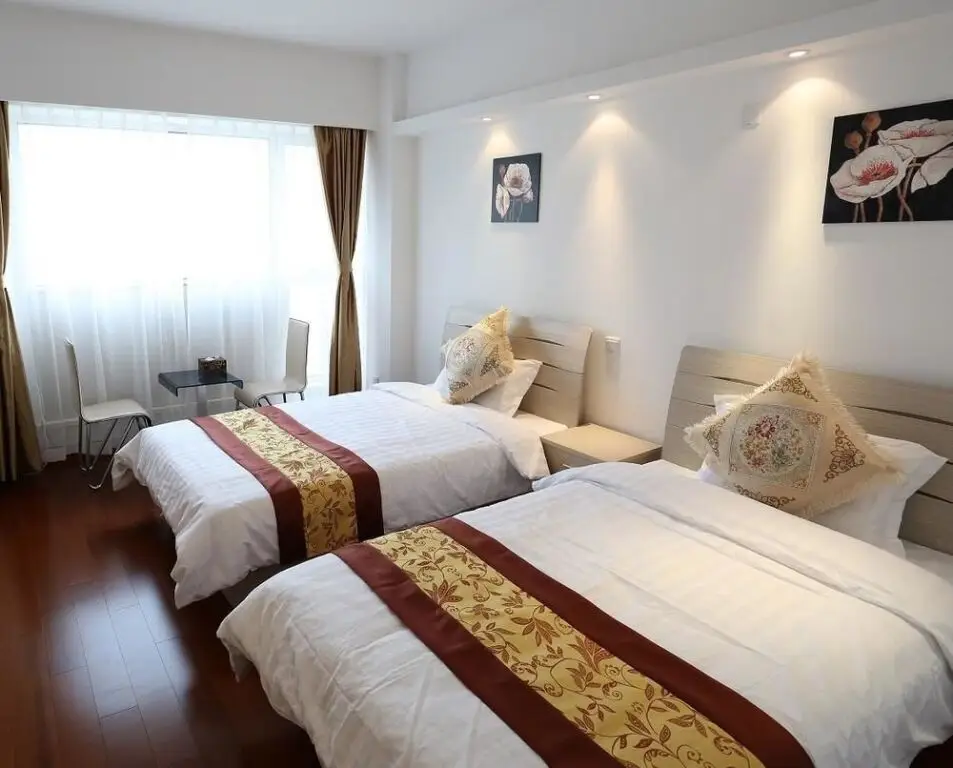 Циндао: Xianglishe Apartment Hotel
