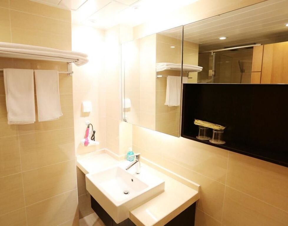 Циндао: Xianglishe Apartment Hotel