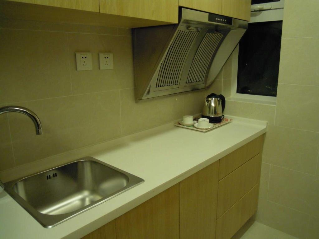 Далянь: Dalian Mingrui Zuoan Classic Fashion Apartment