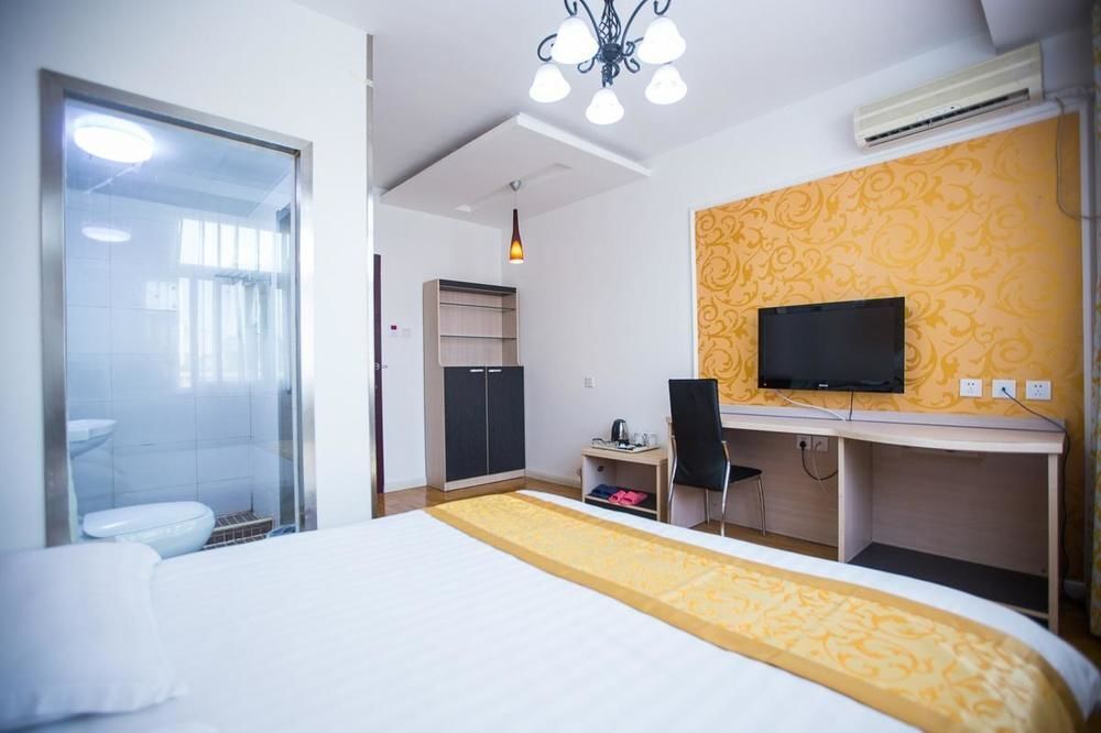 Циндао: Qingdao Aisen Apartment Hotel