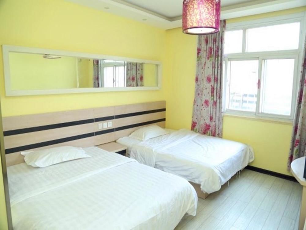 Циндао: Qingdao Aisen Apartment Hotel