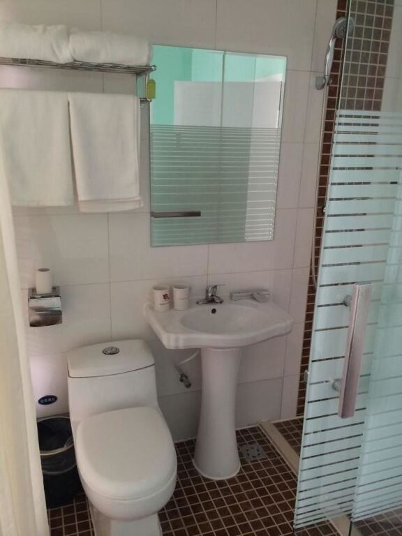 Циндао: Qingdao Aisen Apartment Hotel