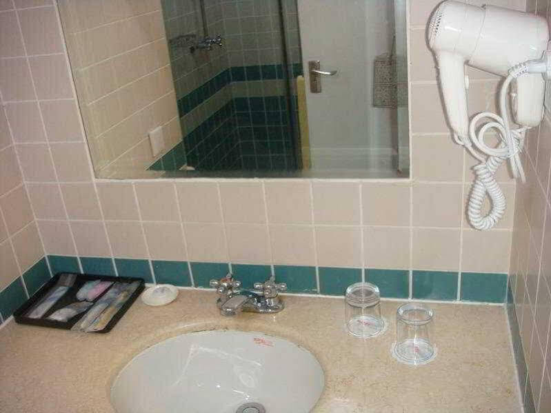 Шанхай: Motel 168 Ao Men Road Inn