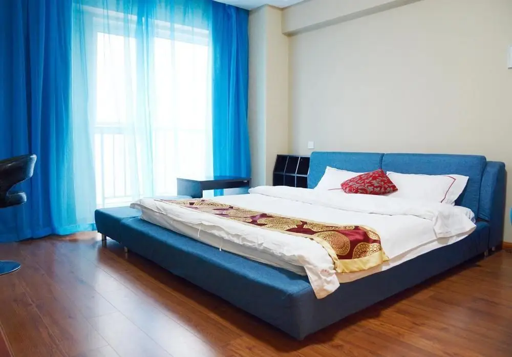 Далянь: Dalian Sea View Deluxe Apartment-wanda Plaza