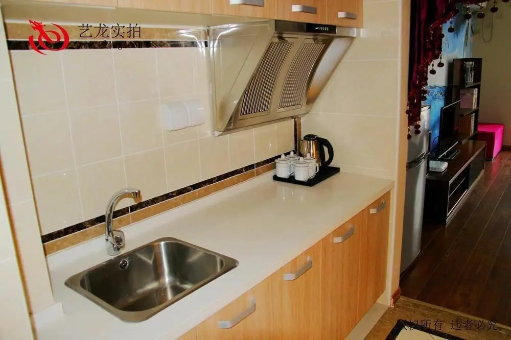 Далянь: Dalian Sea View Deluxe Apartment-wanda Plaza