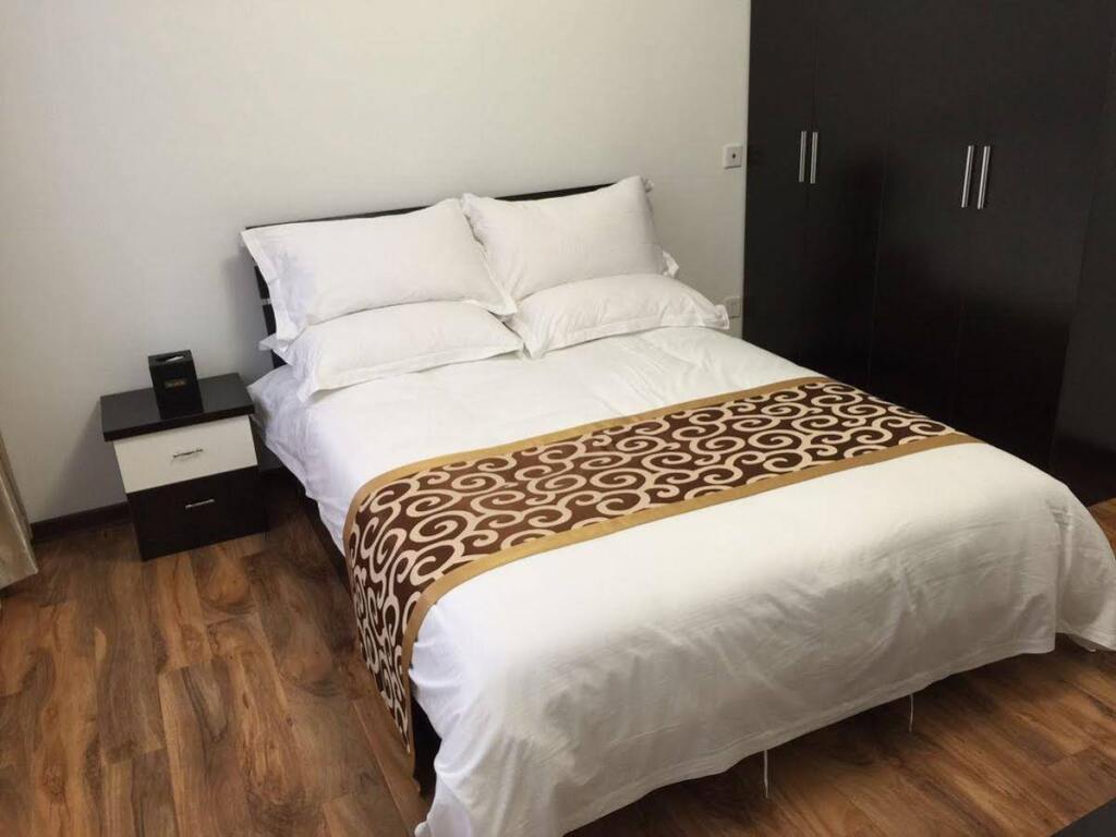 Шанхай: Harcourts Executive Hotel
