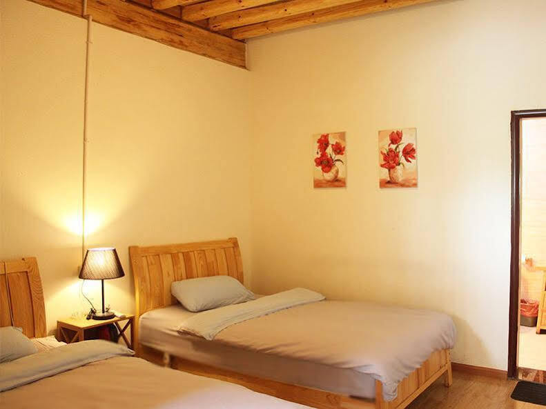 Lijiang Hefenghut Inn — фото 1