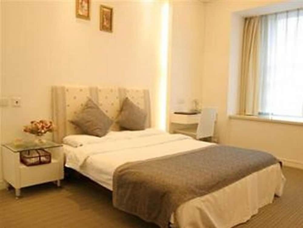 Шанхай: New Space Huiyuan Apartment