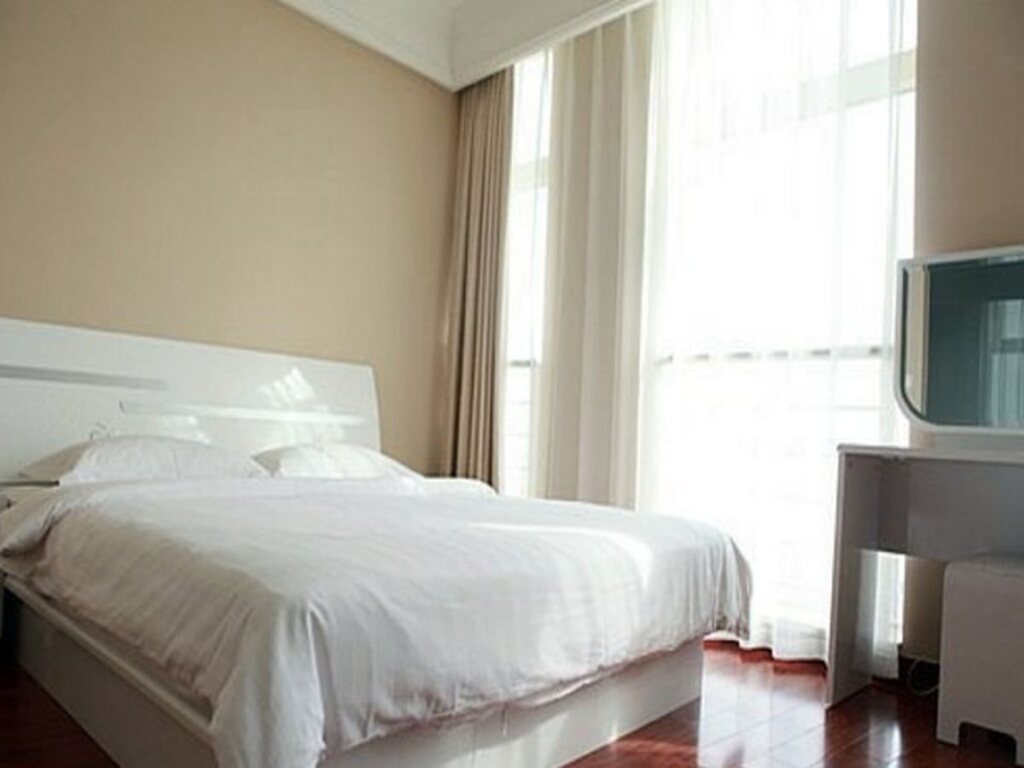 Шанхай: Chenlong Service Apartment (Yuanda building)