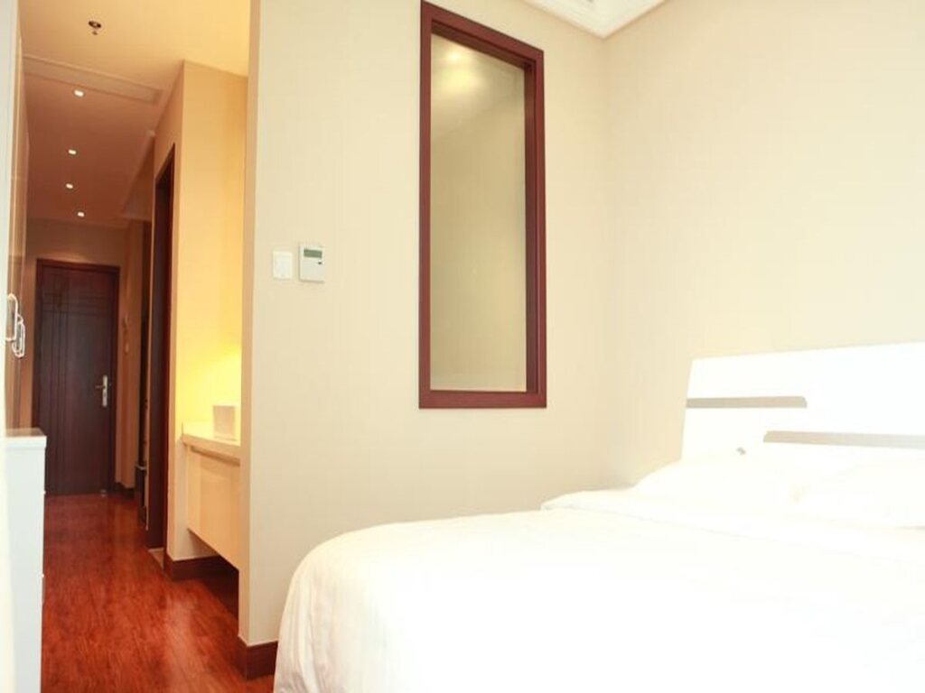 Шанхай: Chenlong Service Apartment (Yuanda building)