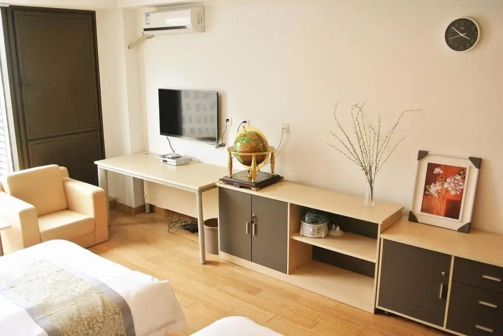 Циндао: Qingdao Lewo Boutique Apartment