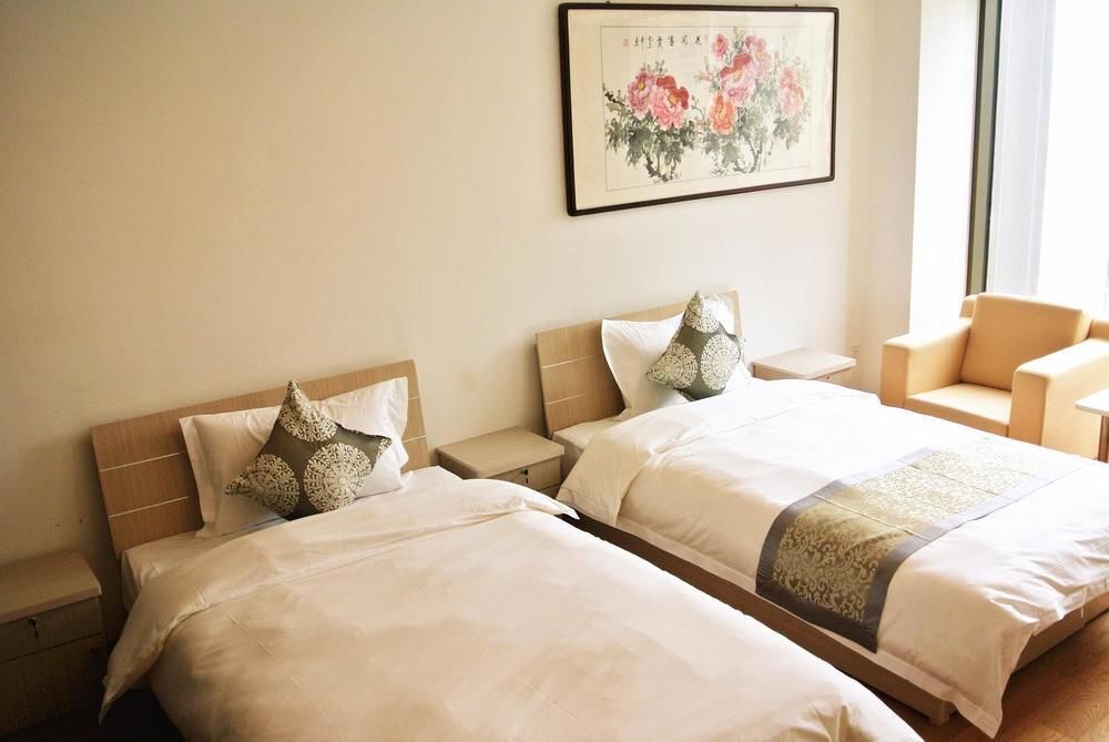 Циндао: Qingdao Lewo Boutique Apartment