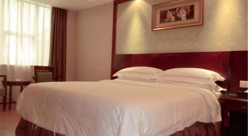 Шэньчжэнь: Vienna International Hotel Shenzhen Shuanglong Subway Station