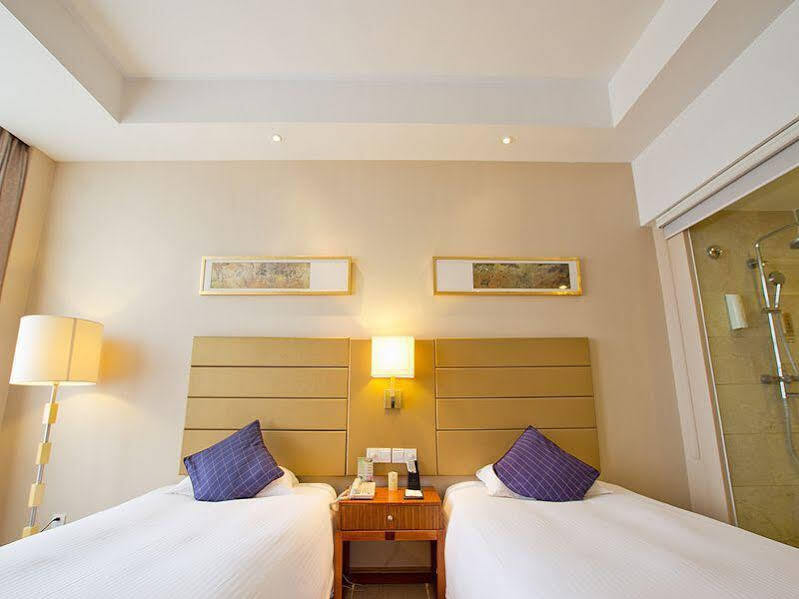 Цзинань: Jinan Zhangqiu Inzone Garland Hotel