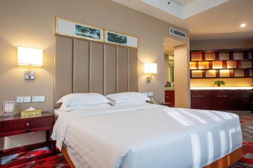 Цзинань: Jinan Zhangqiu Inzone Garland Hotel