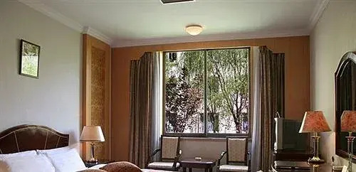 Мяньян: Jiuzhaigou Qianhe International Hotel