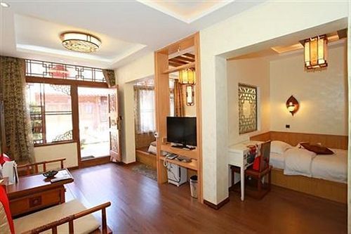 Лицзян: Lion Rock Baboo Park Hotel - Lijiang
