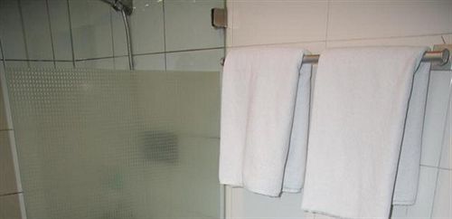 Циндао: Huiheju Business Hotel - Tsingtao