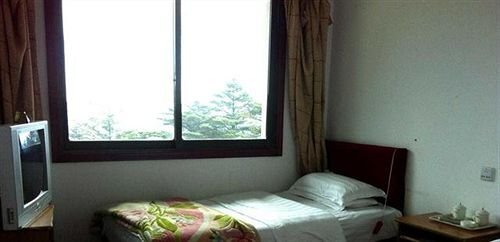 Mount Emei Jindingxiang Huaili Hotel — фото 1