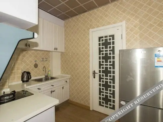 Далянь: Dalian Xinghai Square Holiday Apartment