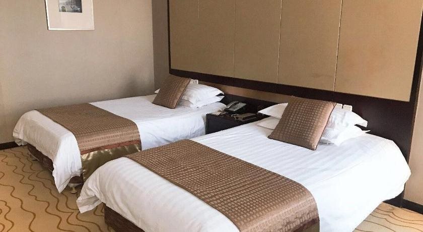 Циндао: Qingdao Bauhinia Garden Hotel
