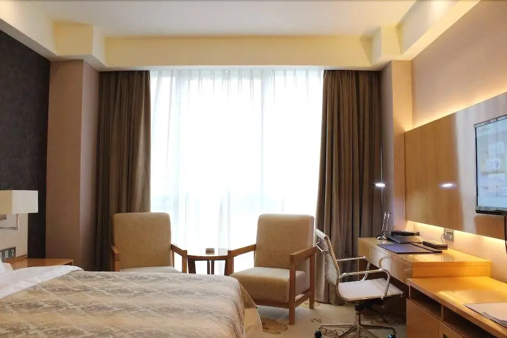 Шанхай: ZiJinTongXin Hotel