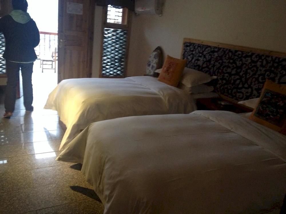 Леишан: Xijiang Huayin Holiday Hotel