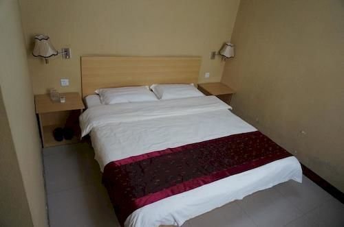 Лиаоченг: Sunshine Business Hotel