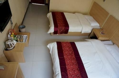 Лиаоченг: Sunshine Business Hotel