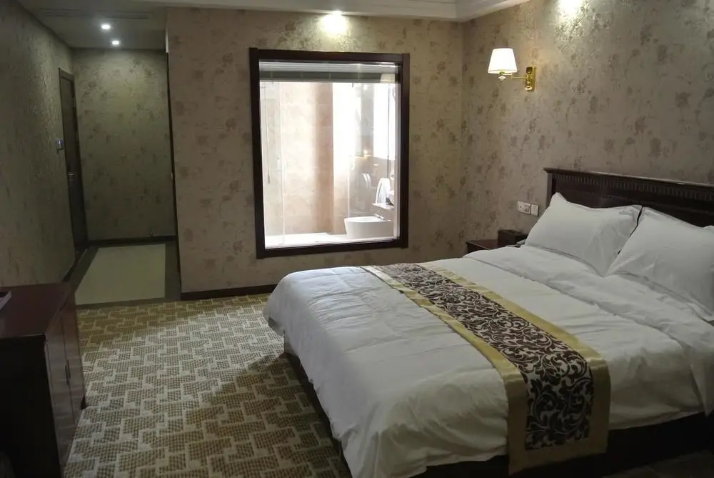 Тайчжоу: Xianju Baita Business Hotel