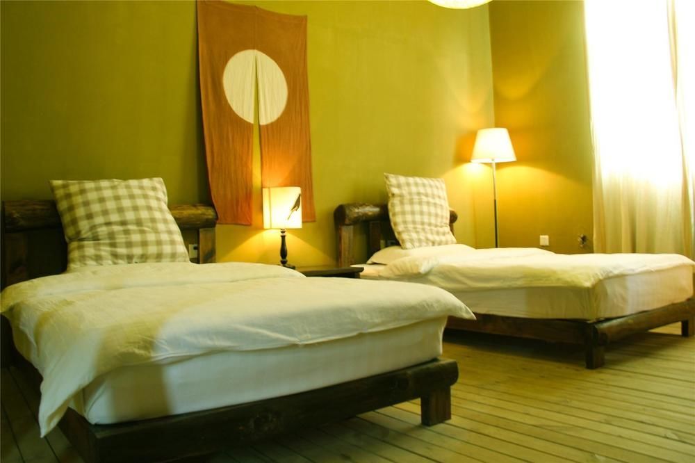 Дали: Caicun Mulanzi Inn