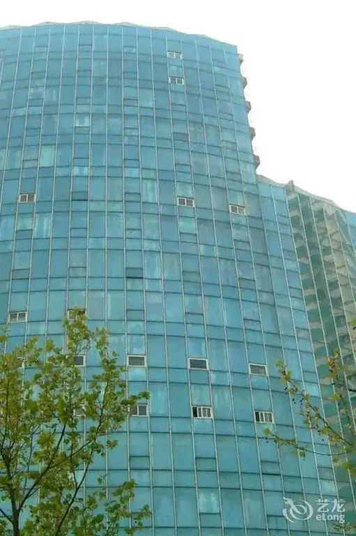 Циндао: Haibian Renjia Apartment