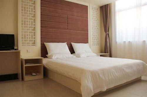 Хецзе: Wan Da Zhi Xing Hotel