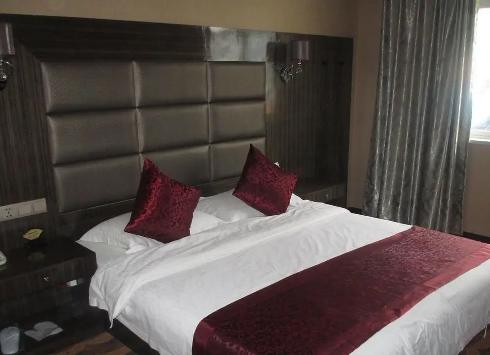 Цзинхун: Xishuangbanna Huixiang Business