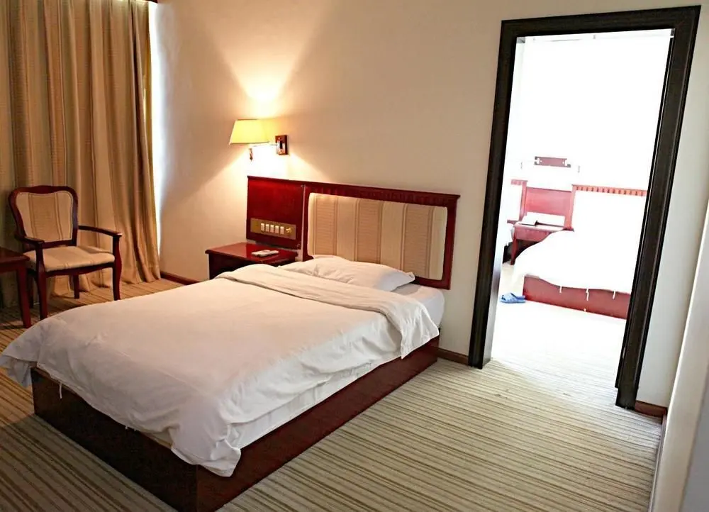 Цзинхун: Xishuangbanna Huixiang Business