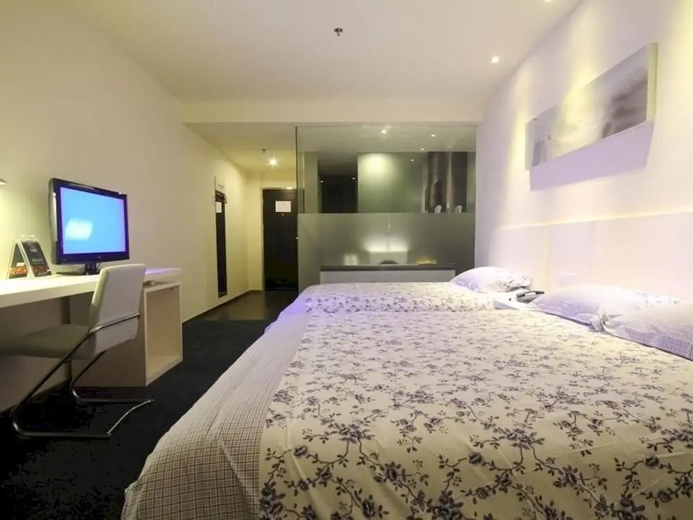 Уси: Motel 168 Hotel