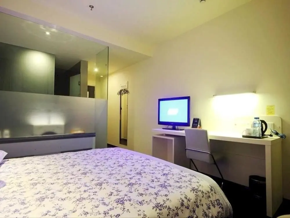 Уси: Motel 168 Hotel