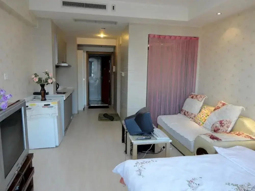 Далянь: Chengshi Gongyuan Apartment - Dalian