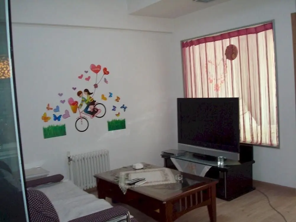 Далянь: Chengshi Gongyuan Apartment - Dalian