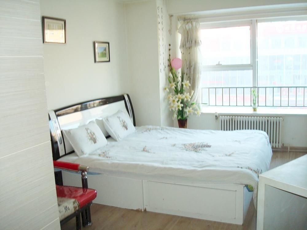 Далянь: Chengshi Gongyuan Apartment - Dalian