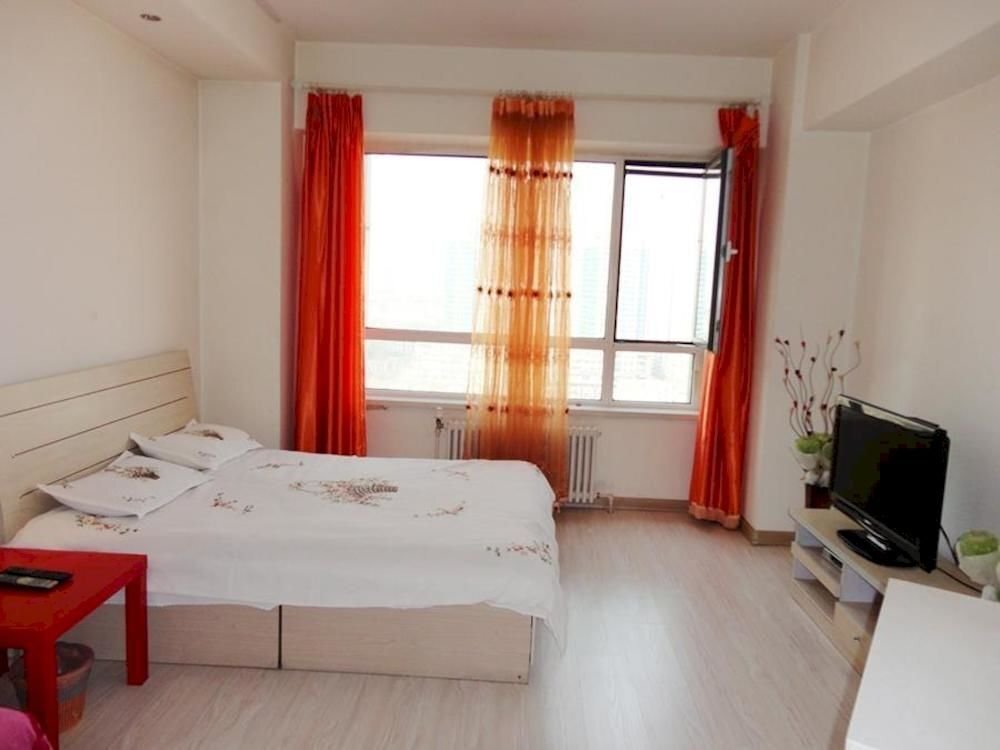 Далянь: Chengshi Gongyuan Apartment - Dalian