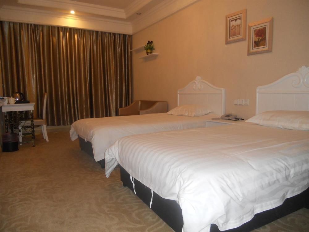 Циндао: Aizunke Hotel