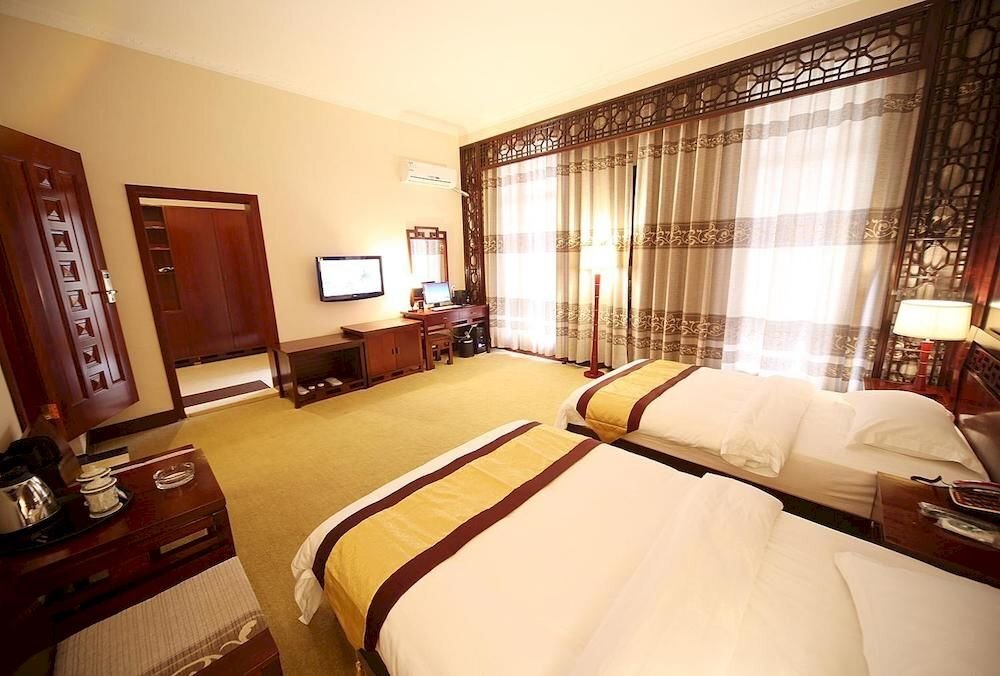 Баошань: Yumingju Hotel
